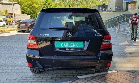 Сзади